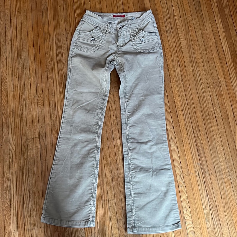 Tan low rise corduroy jeans. Super comfortable and stylish.
